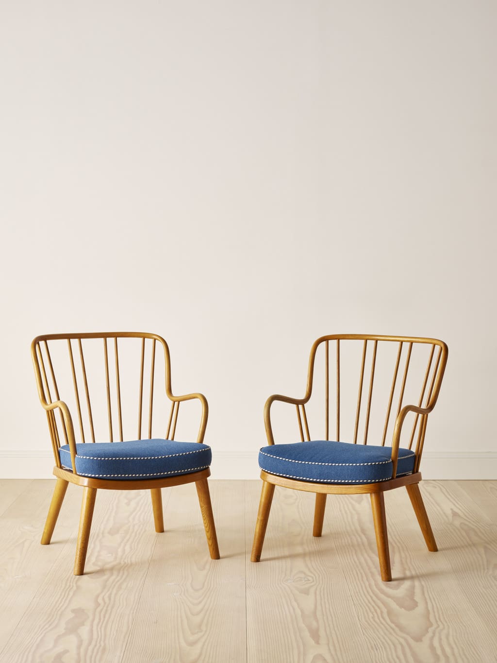A pair of easy chairs in elm by Fritz Hansen, 1940's