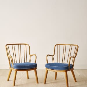 A pair of easy chairs in elm by Fritz Hansen, 1940's