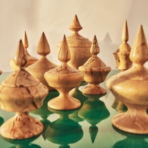 A set of twelve wooden bowls with lids by Oskar Johansson