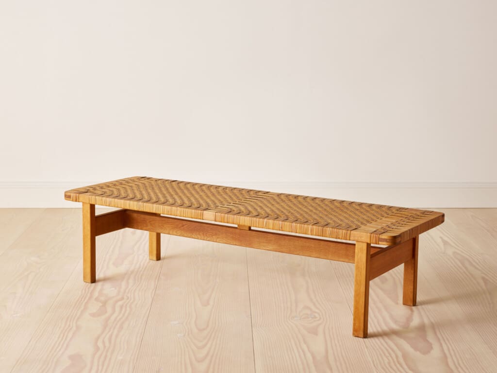 A midcentury bench in oak and rattan by Børge Mogensen