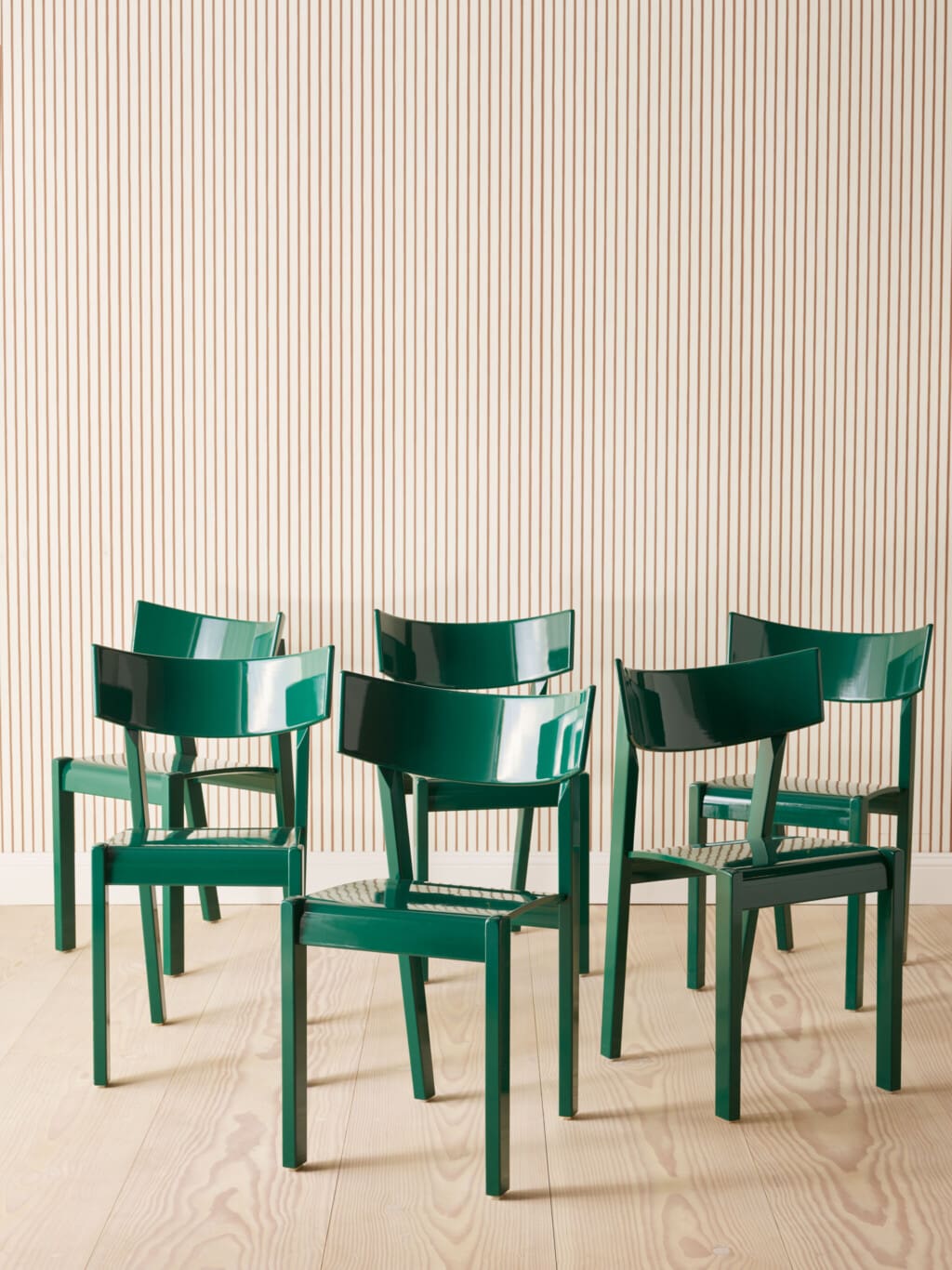 A set of six "Tati" dining chairs in green lacquer