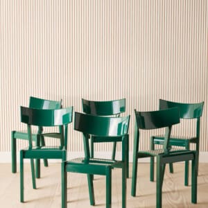 A set of six "Tati" dining chairs in green lacquer