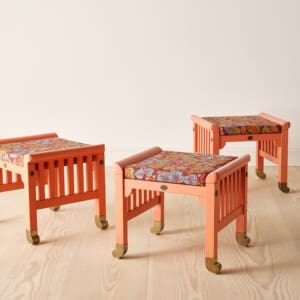 Three peach-colored stools with cushions from "The Eden Collection" by Swedish designer Kerstin Hörlin-Holmquist