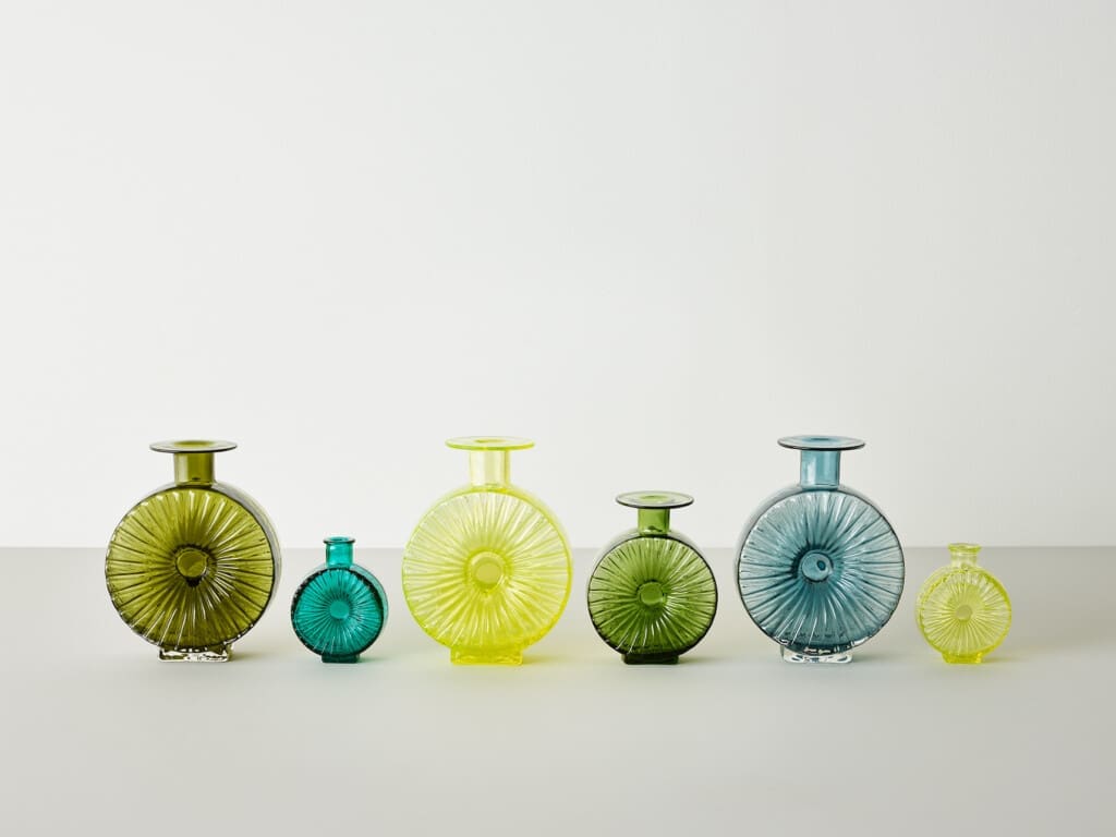 A group of six Helena Tynell round glass bottles