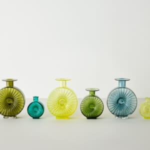 A group of six Helena Tynell round glass bottles