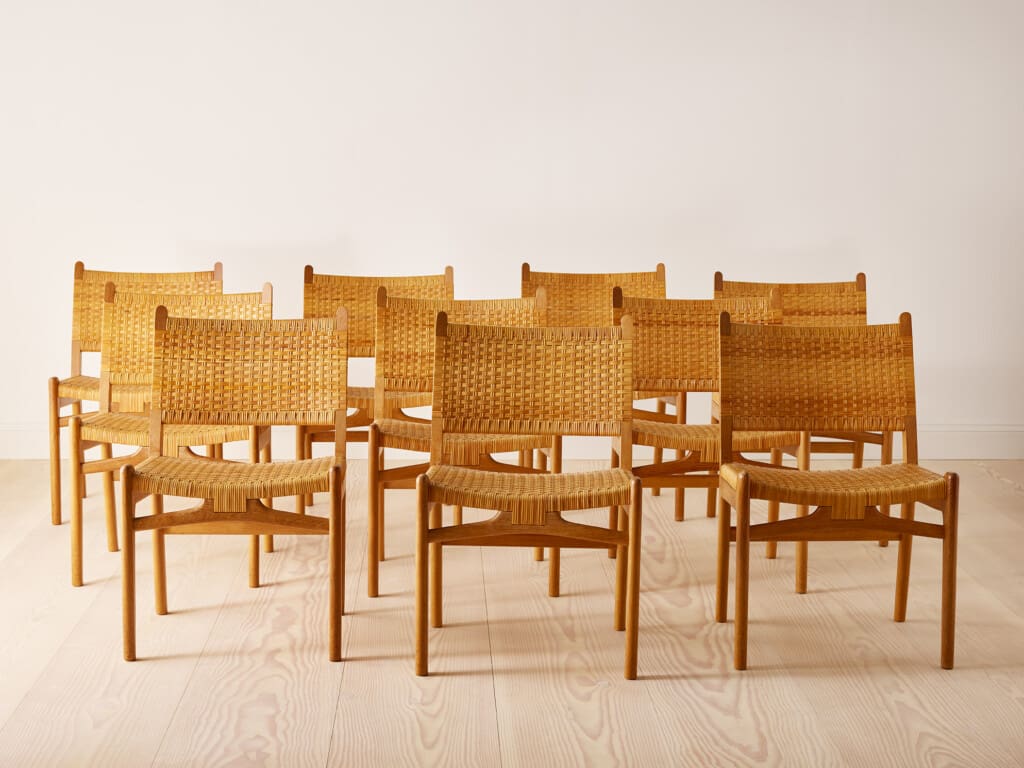 A set of ten oak and rattan 'CH31' chairs by Hans J Wegner