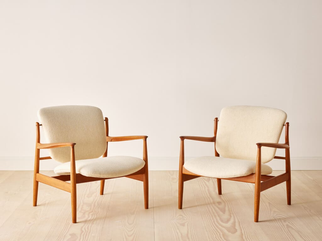 A pair of classic lounge chairs by extraordinary Danish furniture designer Finn Juhl, Model 136