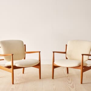A pair of classic lounge chairs by extraordinary Danish furniture designer Finn Juhl, Model 136