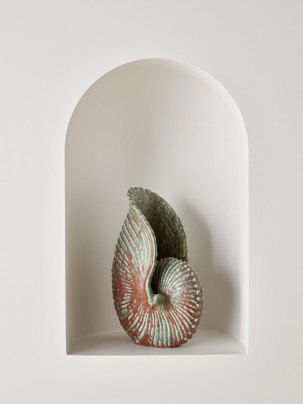 A ceramic sea shell sculpture by Gunnar Nylund