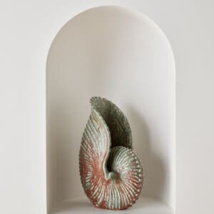 A ceramic sea shell sculpture by Gunnar Nylund
