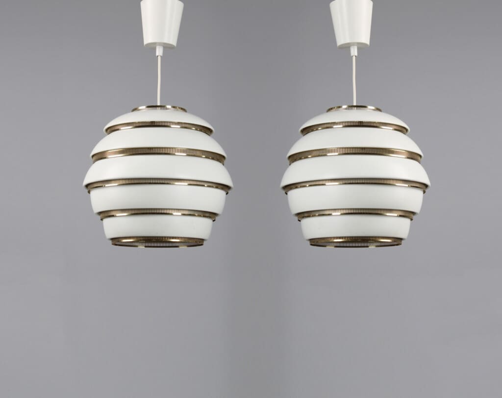 A pair of Alvar Aalto "Beehive" ceiling lamps