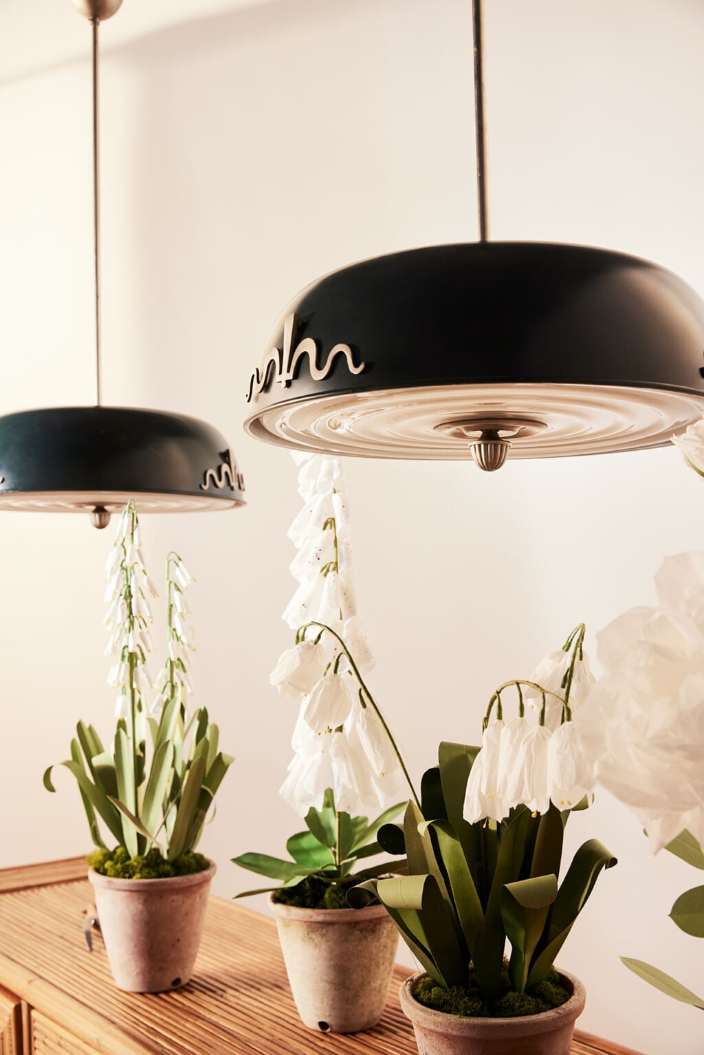 A pair of ceiling lamps by Harald Notini