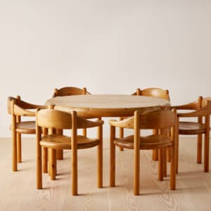 Round pine dining table with eight armchairs by Rainer Daumiller for Hirtshals Savværk. Denmark, 1970s